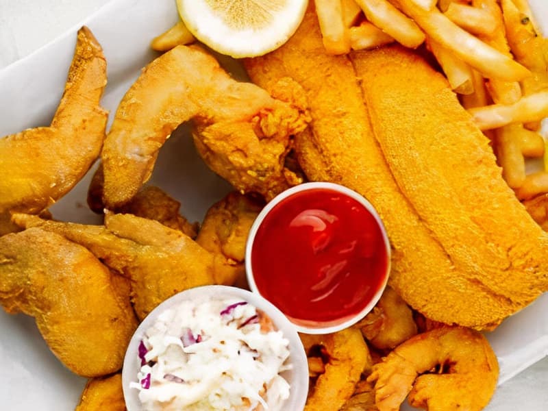2 Pc Whole Wings, 1 Pc Whiting Fish, 5 Pc Fried Shrimp with Fries or Rice